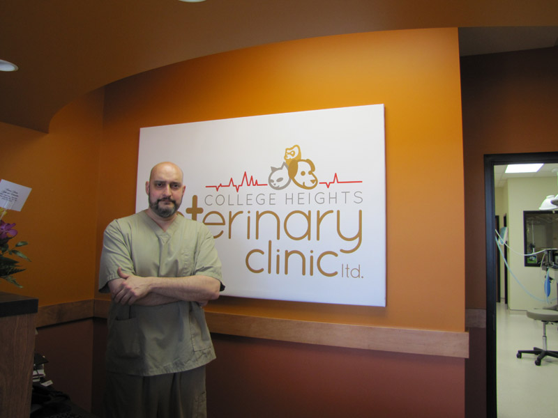 Dr. Ricardo Bonafine in front of clinic sign